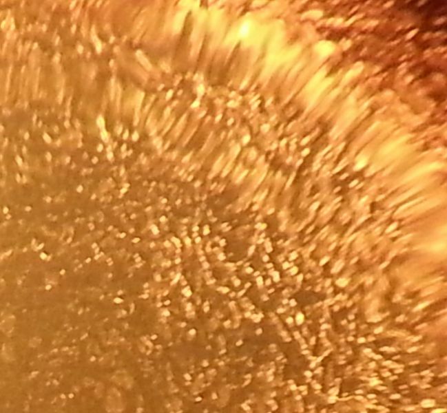 Mikroskopie gelber synthetischer Sternsaphir